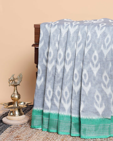Subtle Grey Ikkat with Pop of Green Border Saree