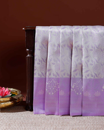 Elegant Litchi Silk Saree with Intricate Zari Woven Motifs and Elaborate Border Design - Lavender