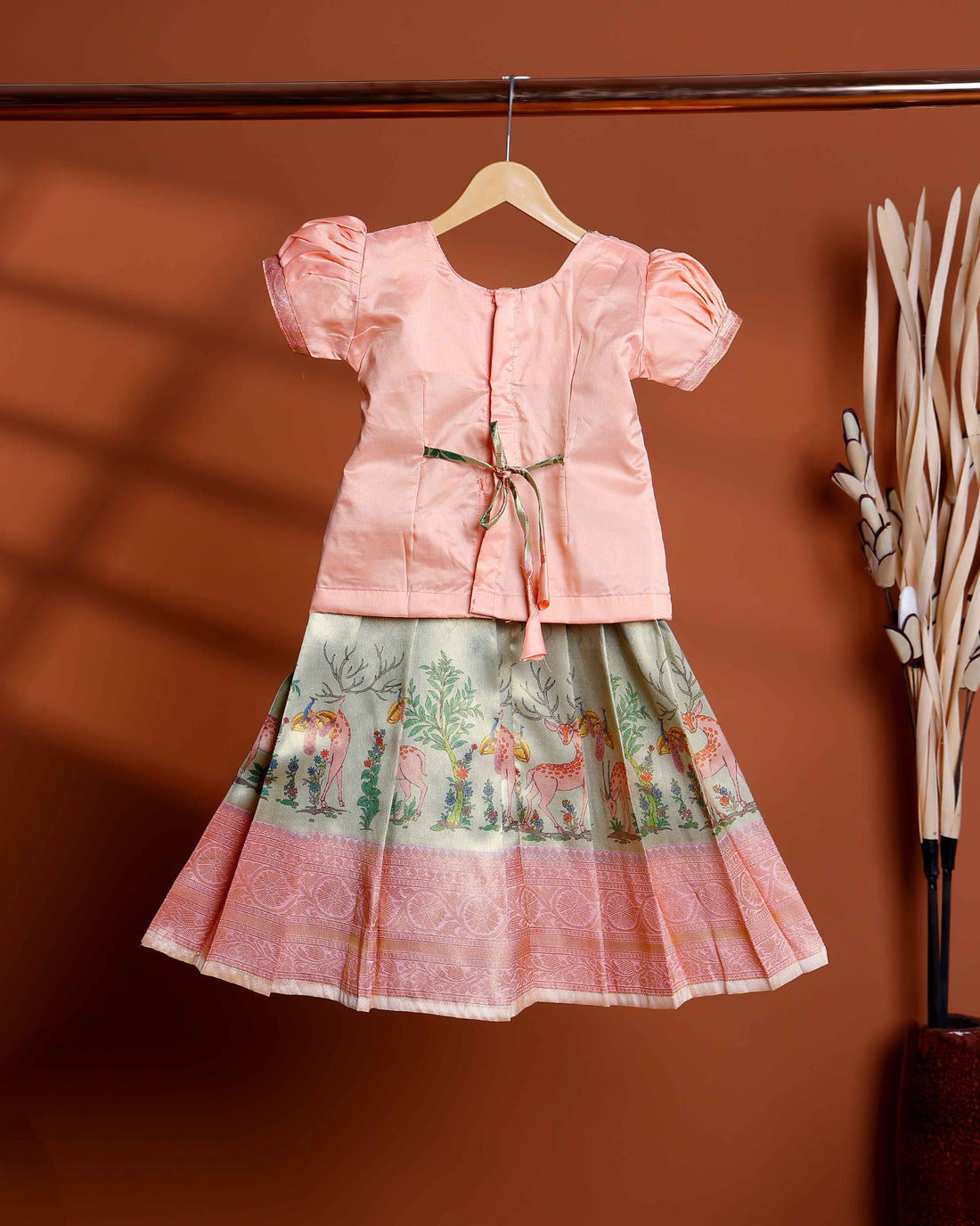 Kids Readymade Pattu Pavadai Set with Embellished Neck Puff Sleeve Blouse and Printed Skirt - Peach