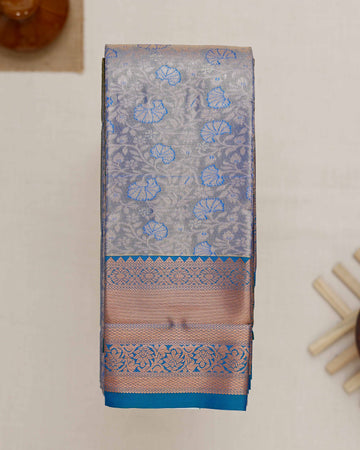 Exquisite Kanchipuram Tissue Saree with Floral Zari Weave and Intricate Border - Blue