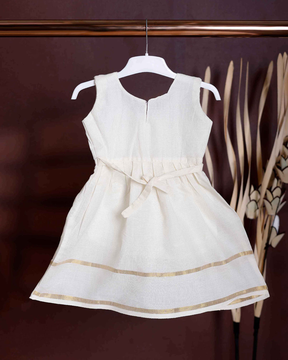 Traditional Kerala Kasavu Style Girls' Frock with Gold Zari Border and Neckline Embellishment - Cream