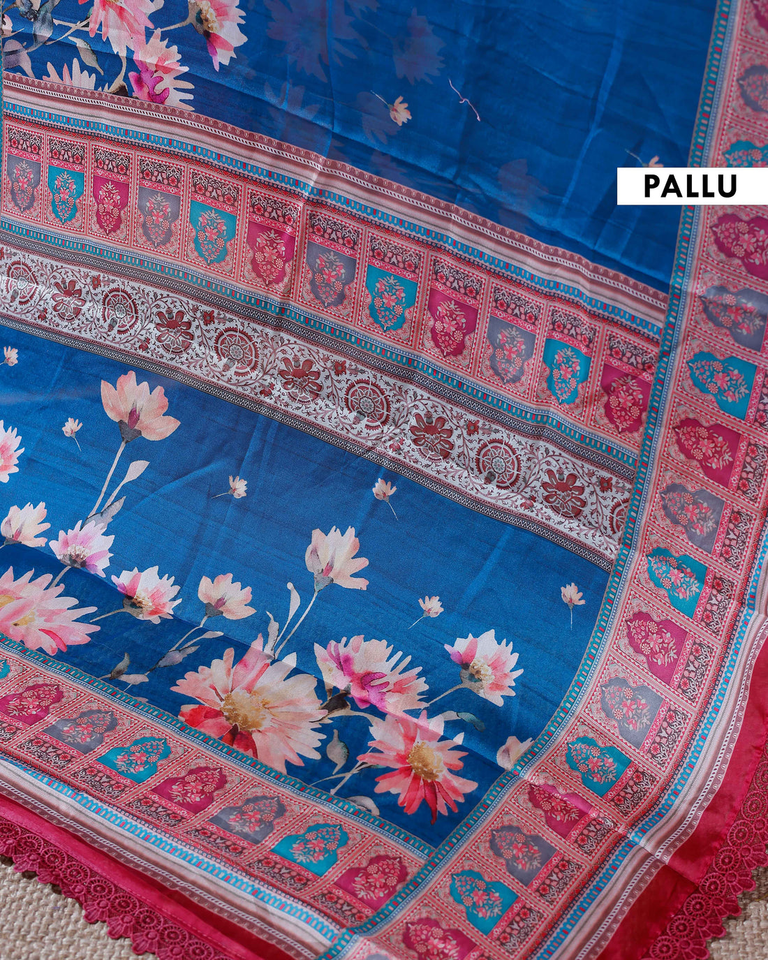 Stylish Georgette Saree with Bold Floral Prints and Traditional Patterned Border - Blue