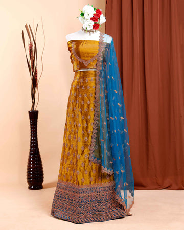 Embellished Semi-Stitched Lehenga Choli with Intricate Embroidery and Jacquard Border Detailing - Gold