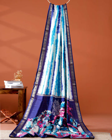 Elegant Navy Blue shades and the rural scenic artwork Dola Saree
