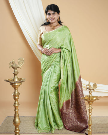 Elegant Handwoven Banarasi Silk Saree Accented with Subtle Zari Buttas and a Classic Zari Border - Green