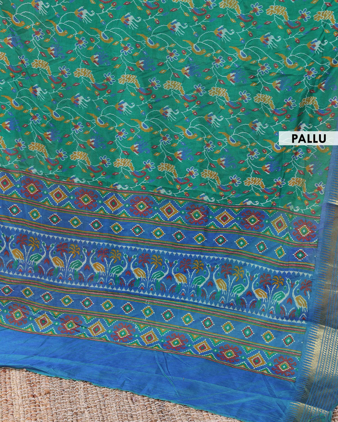 Elegant Patola Saree with Classic Peacock and Geometric Border - Green