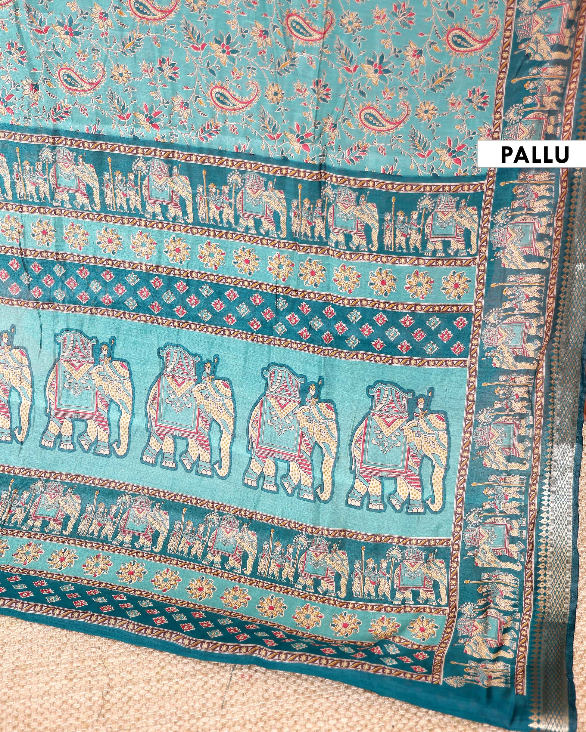 Elegant Semi Chanderi Saree Featuring Floral Butta Pattern and Elephant Motif Pallu - Green