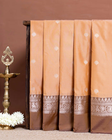 Elegant Soft Silk Saree with Delicate Zari Buttas and Peacock Motif Contrast Border - Peach