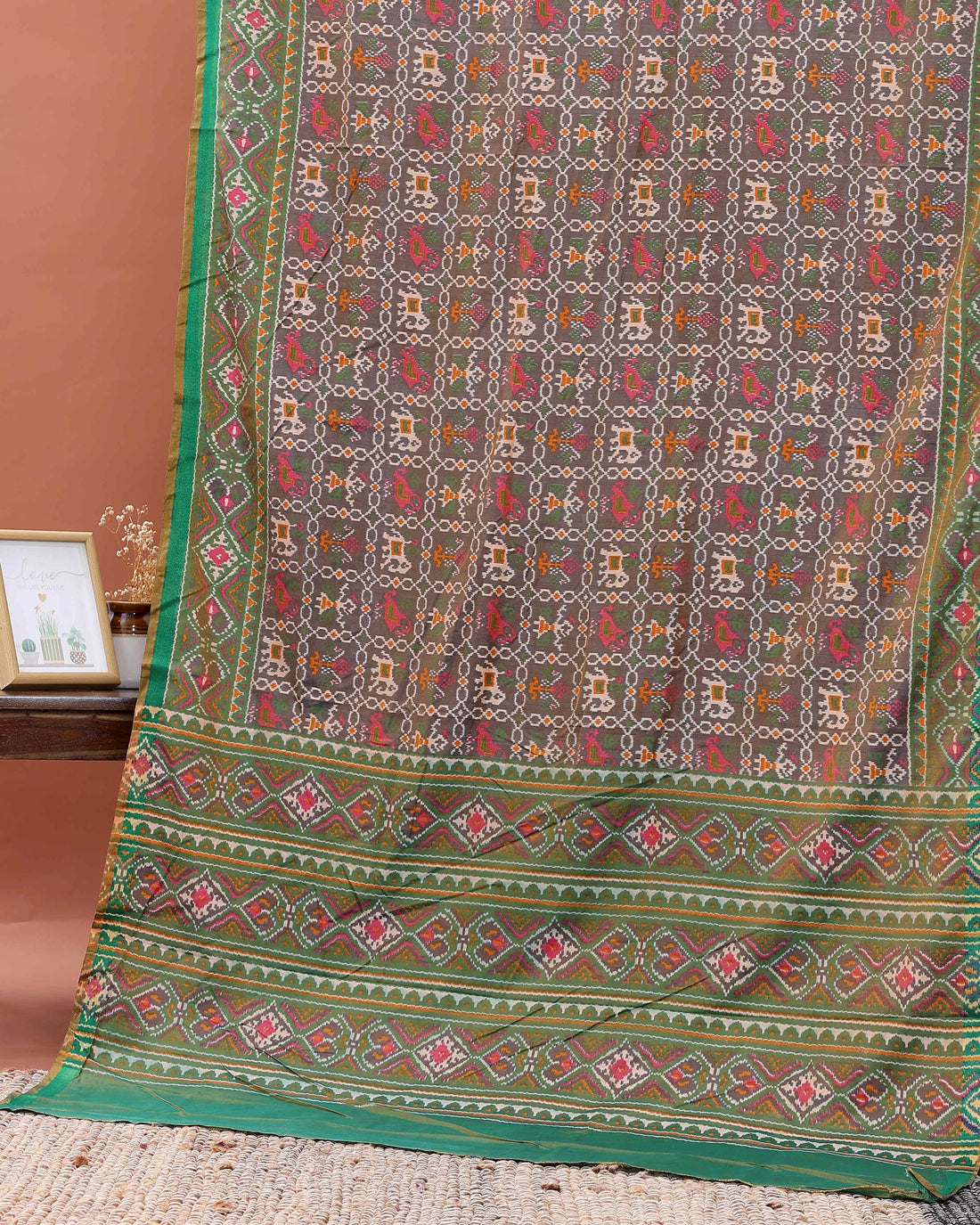 Handwoven Patola Silk Saree with Intricate Ikat Weave and Traditional Geometric Motifs - Brown
