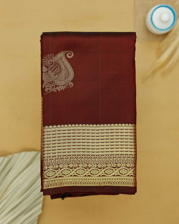 Exquisite Niranjana Silk Saree with Intricate Zari Weave and Peacock Motif - Maroon