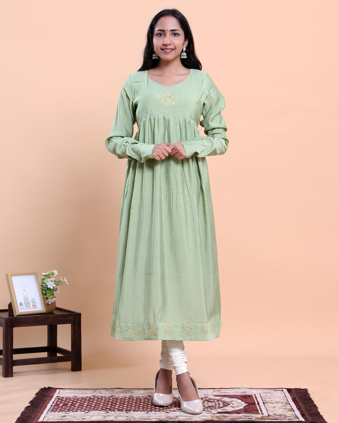 Women's Embroidered Empire Waist Long Kurta with Gathered Flared Hem and Full Sleeves - Green
