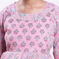 Pink printed maternity wear with empire waist and three quarter sleeves front view 