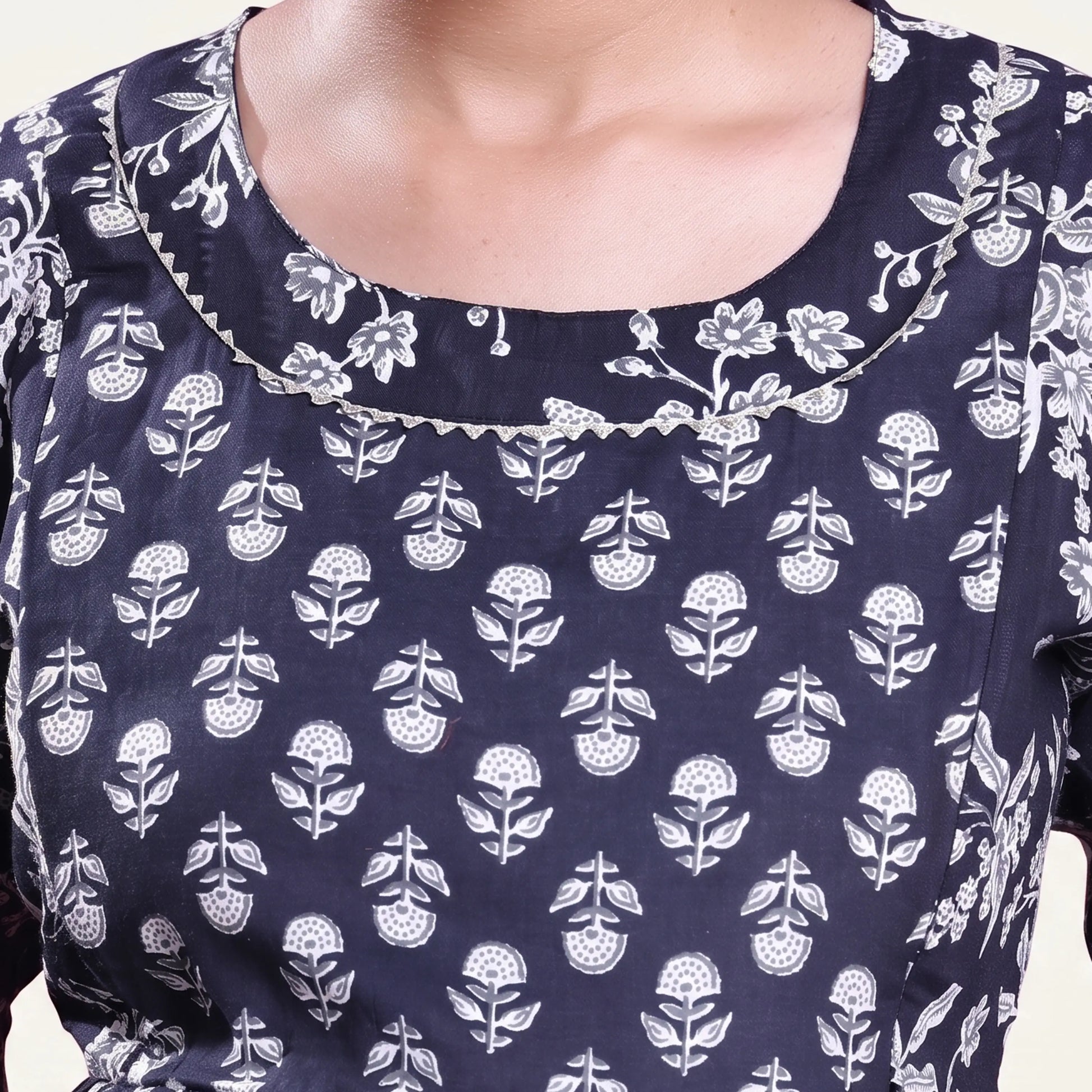 Black printed maternity wear with empire waist and three quarter sleeves front view 