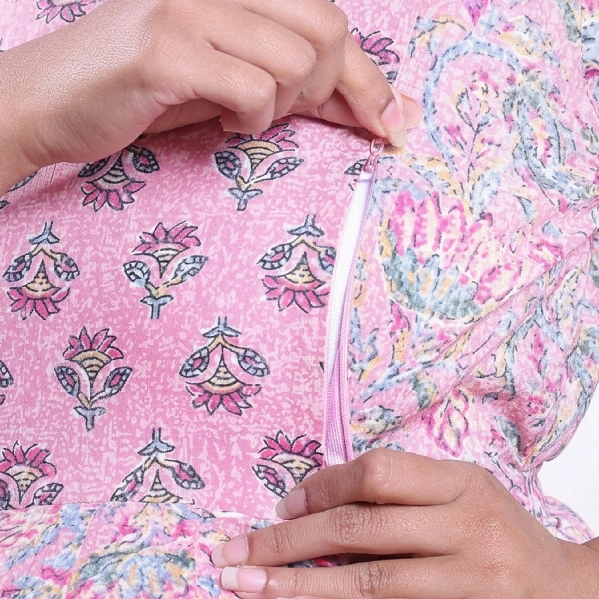 Pink printed maternity wear with empire waist and three quarter sleeves front view 