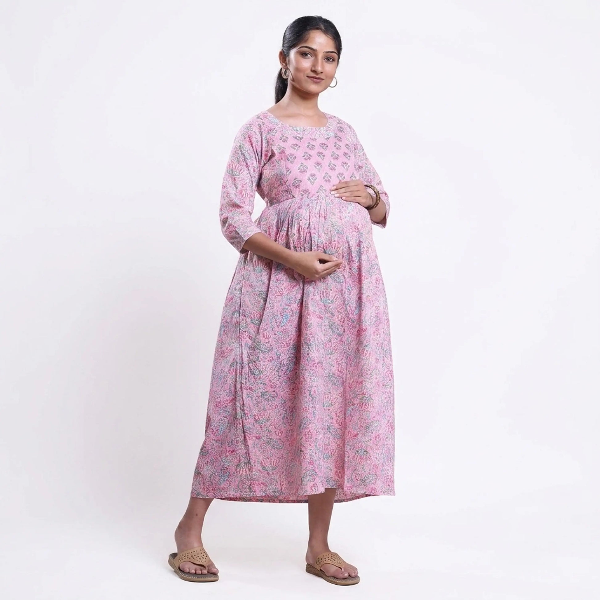 Pink printed maternity wear with empire waist and three quarter sleeves front view 