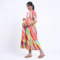 Women's striped maternity wear with tie-back waist and tiered hem multicolor back view on model