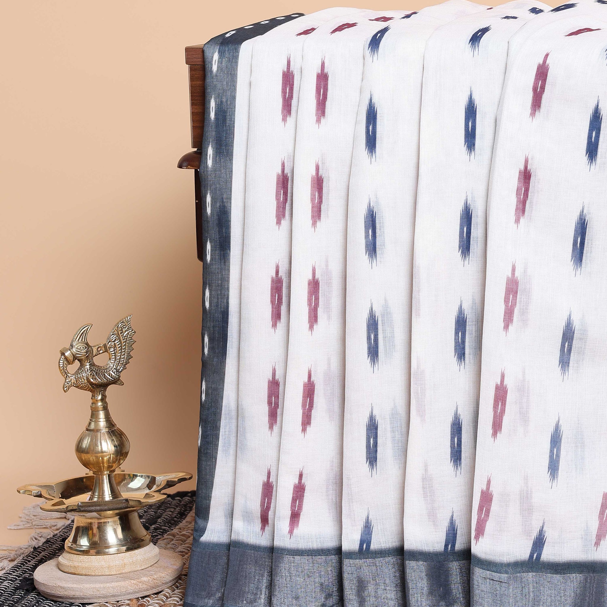 Elegant Ikkat Saree with Contrasting Border and Patterns - White