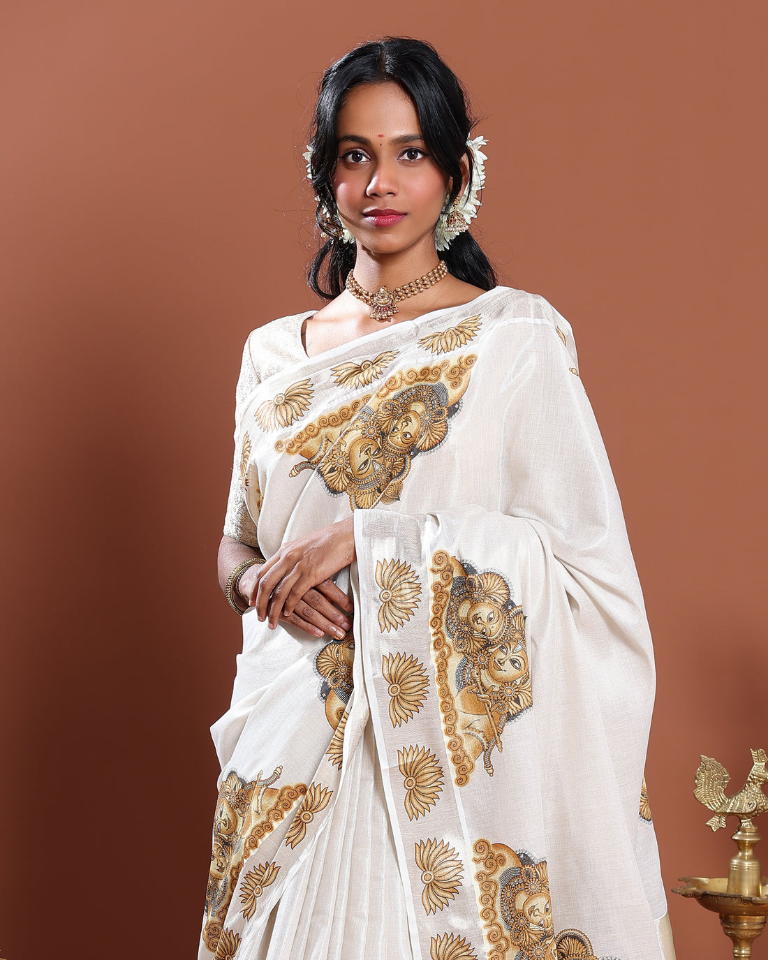Kasavu Kerala Saree with Traditional Mural Art Motifs and Intricate Zari Border - Cream