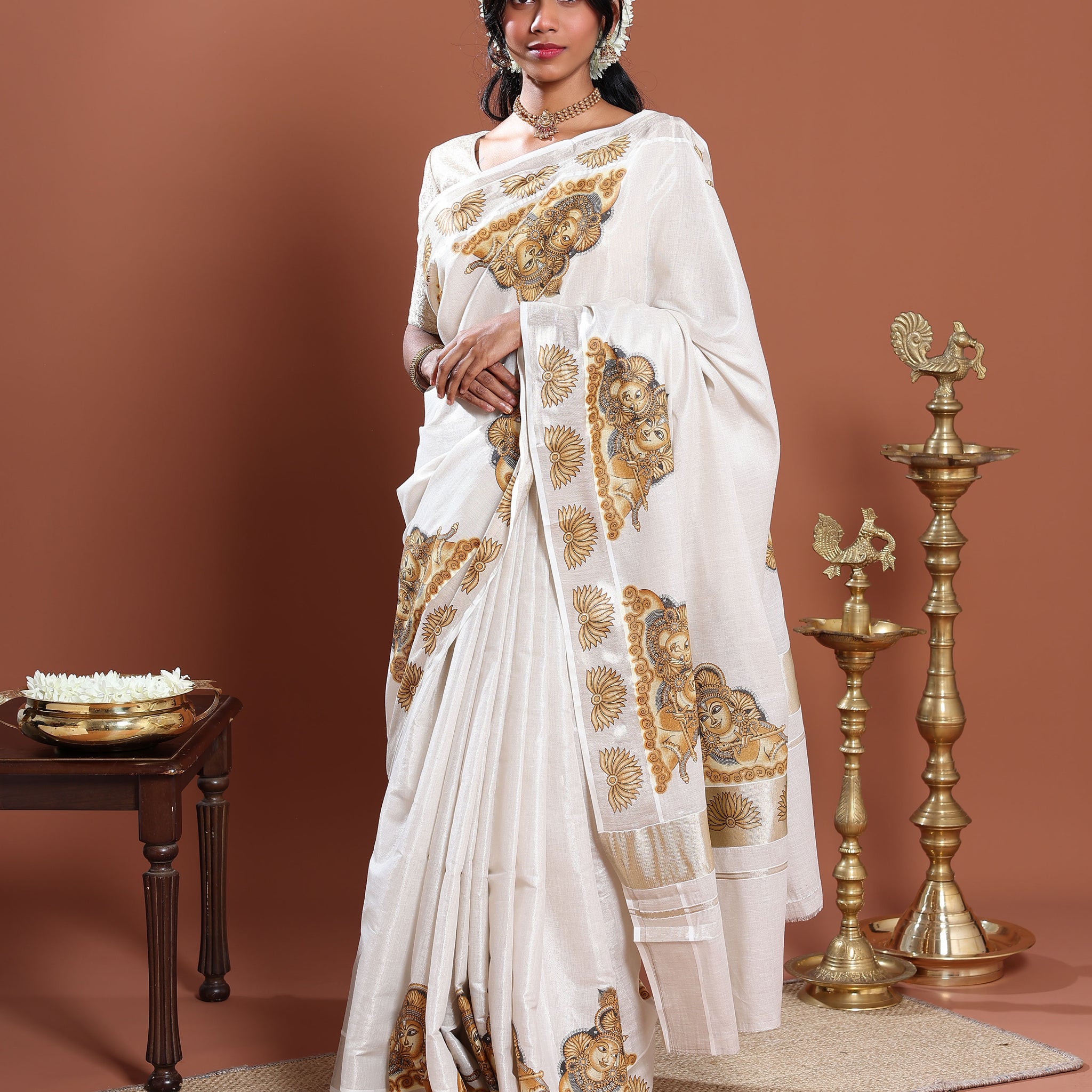 Kasavu Kerala Saree with Traditional Mural Art Motifs and Intricate Zari Border - Cream
