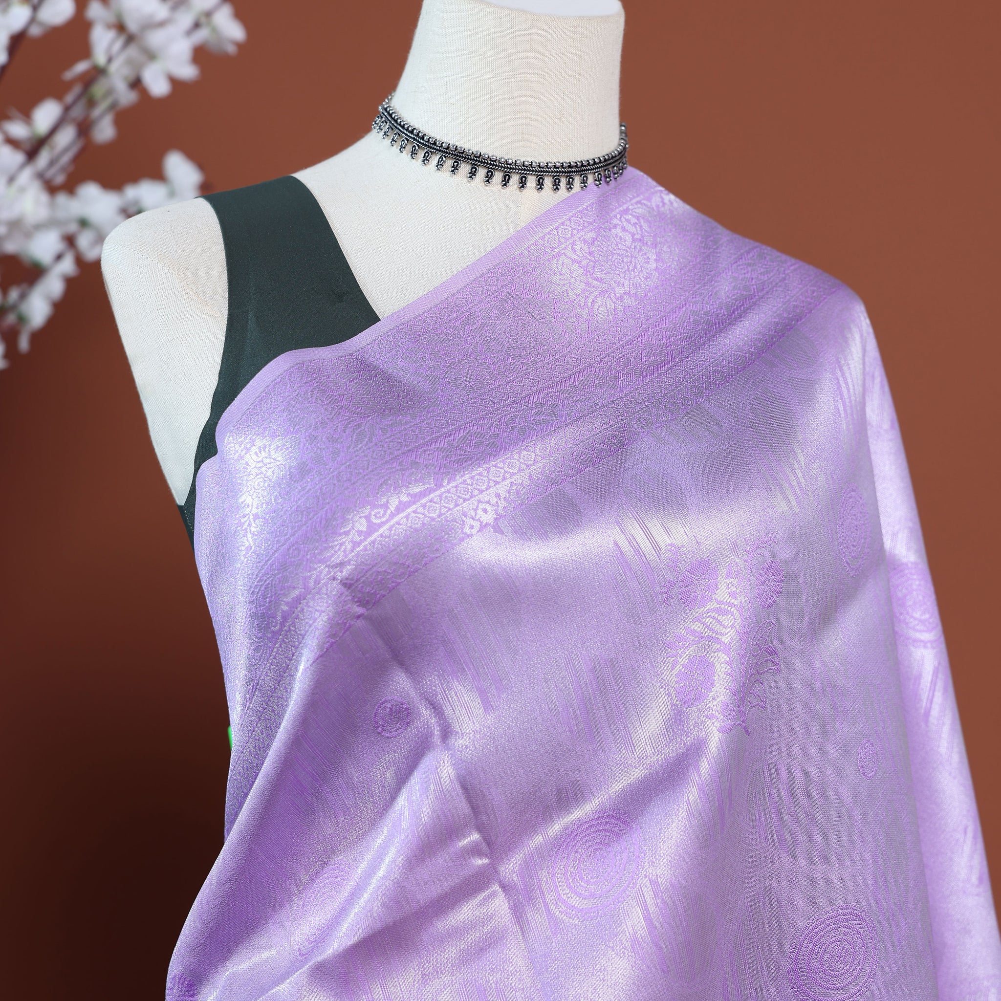 Graceful Litchi Silk Saree with All-Over Woven Motifs and Lustrous Zari Border - Lavender