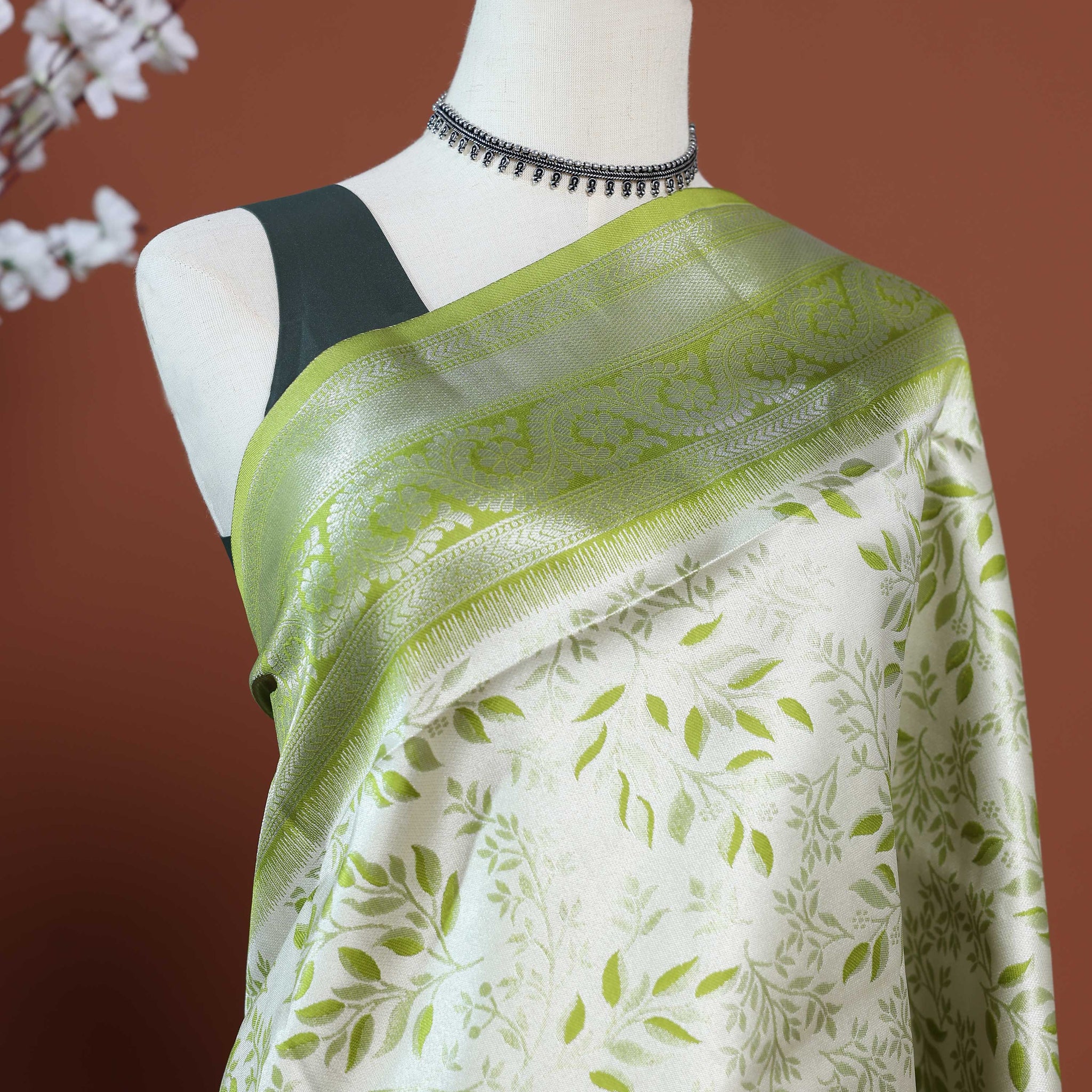 Elegant Floral Woven Design Litchi Silk Saree with Rich Pallu and Subtle Sheen Finish - Green
