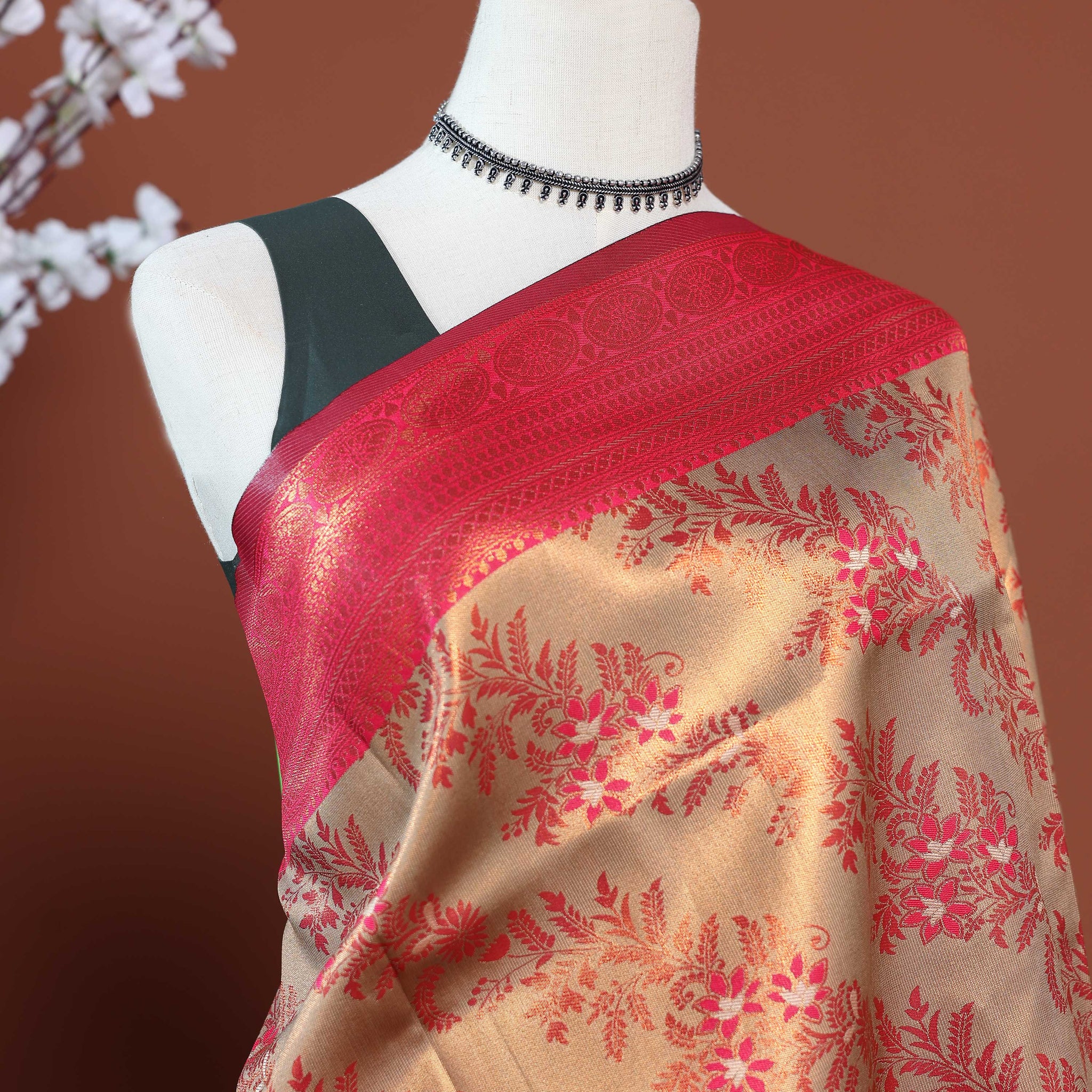 Exquisite Litchi Silk Saree with Contrast Broad Zari Border and All-Over Floral Brocade Weaving - Sandal