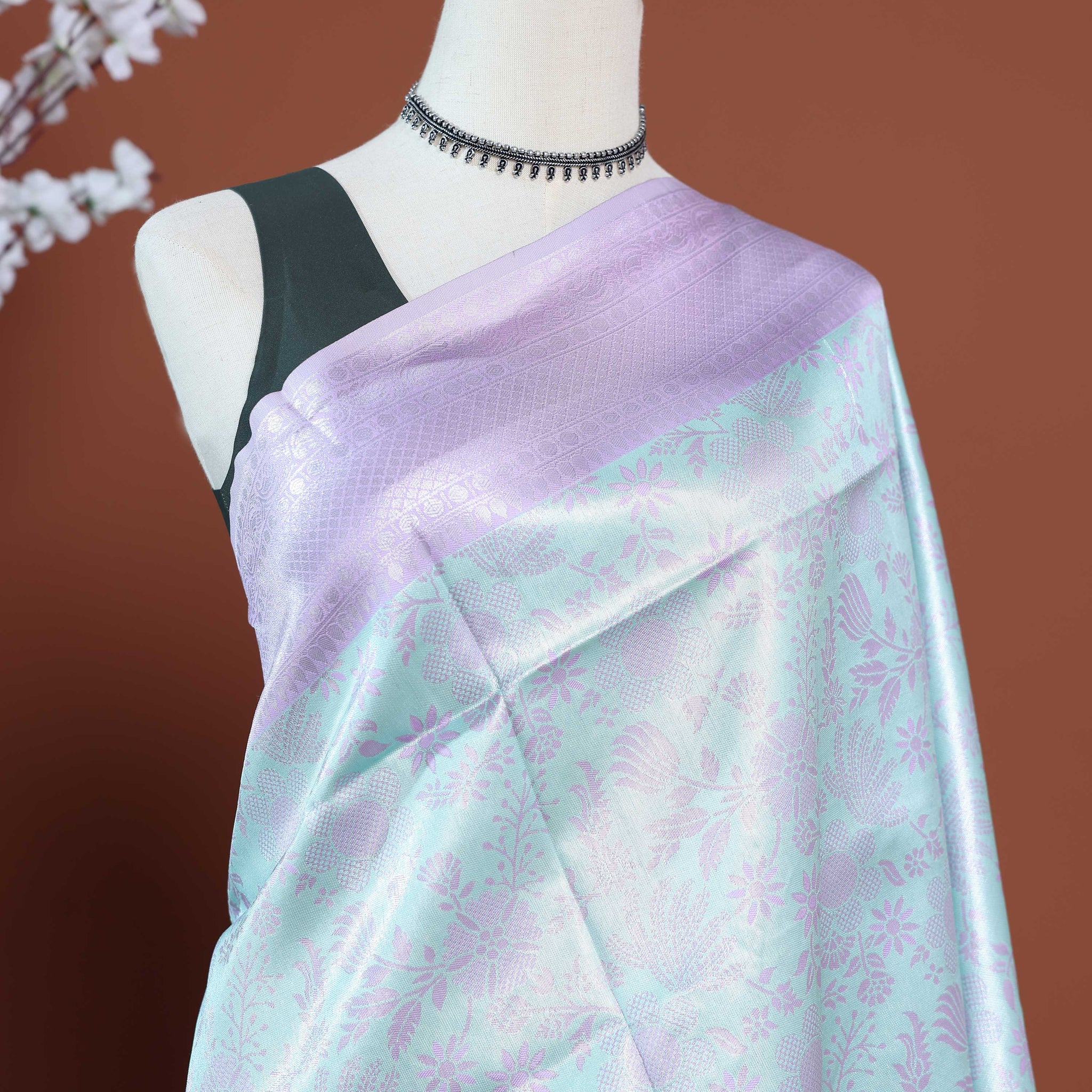 Soft Litchi Silk Saree with Delicate Floral Brocade Weaving and Lustrous Zari Border - Light Blue