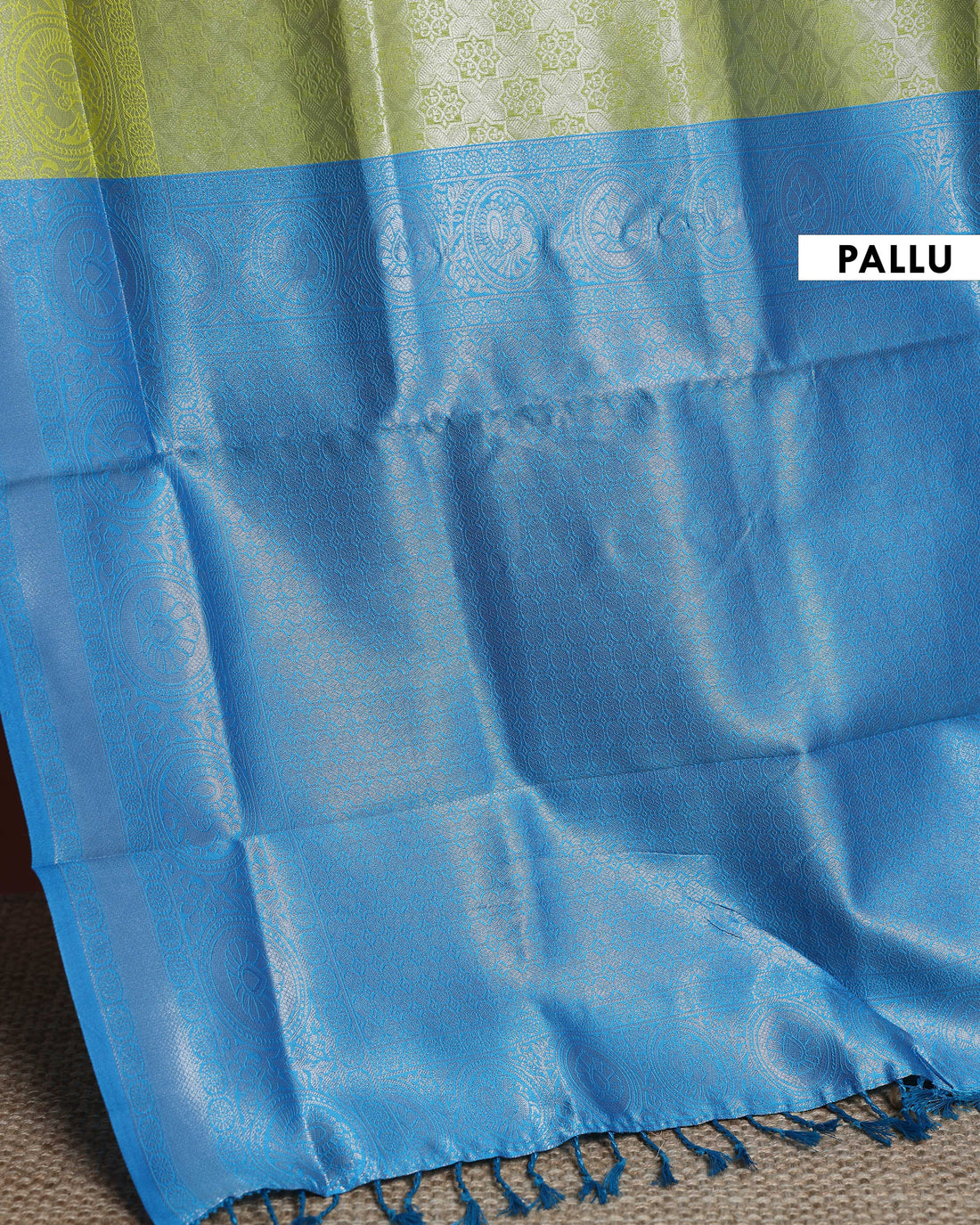 Litchi Silk Saree with Grand Circular Zari Border and Subtle All-Over Jacquard Weaving - Green
