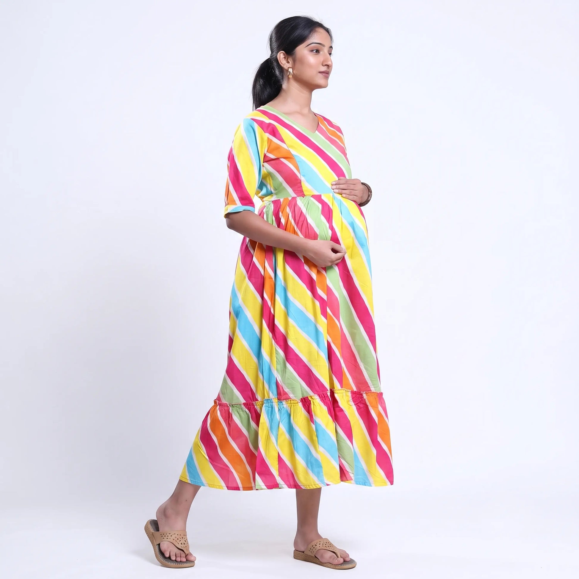 Women's striped maternity wear with tie-back waist and tiered hem multicolor back view on model