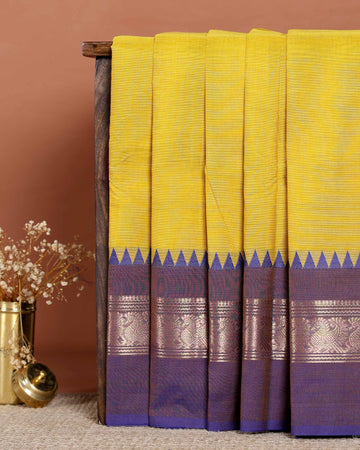 Elegant Traditional Handloom Chettinad Cotton Saree with Woven Temple Border and Intricate Peacock Motif Pallu - Yellow
