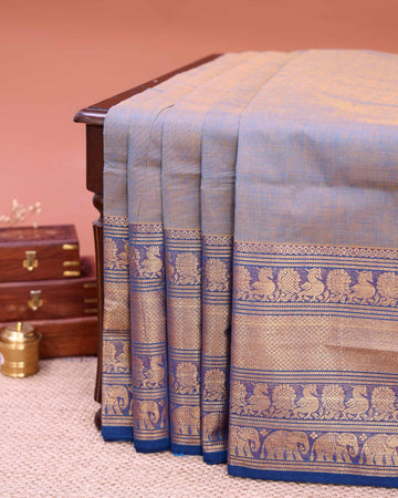 Traditional Venkatagiri Cotton Saree with Plain Body and Intricate Zari Woven Peacock Elephant & Floral Motif Border - Light Blue