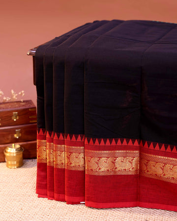 Traditional Handloom Chettinad Cotton Saree with Plain Body and Intricate Zari Woven Temple & Peacock Motif Border - Black