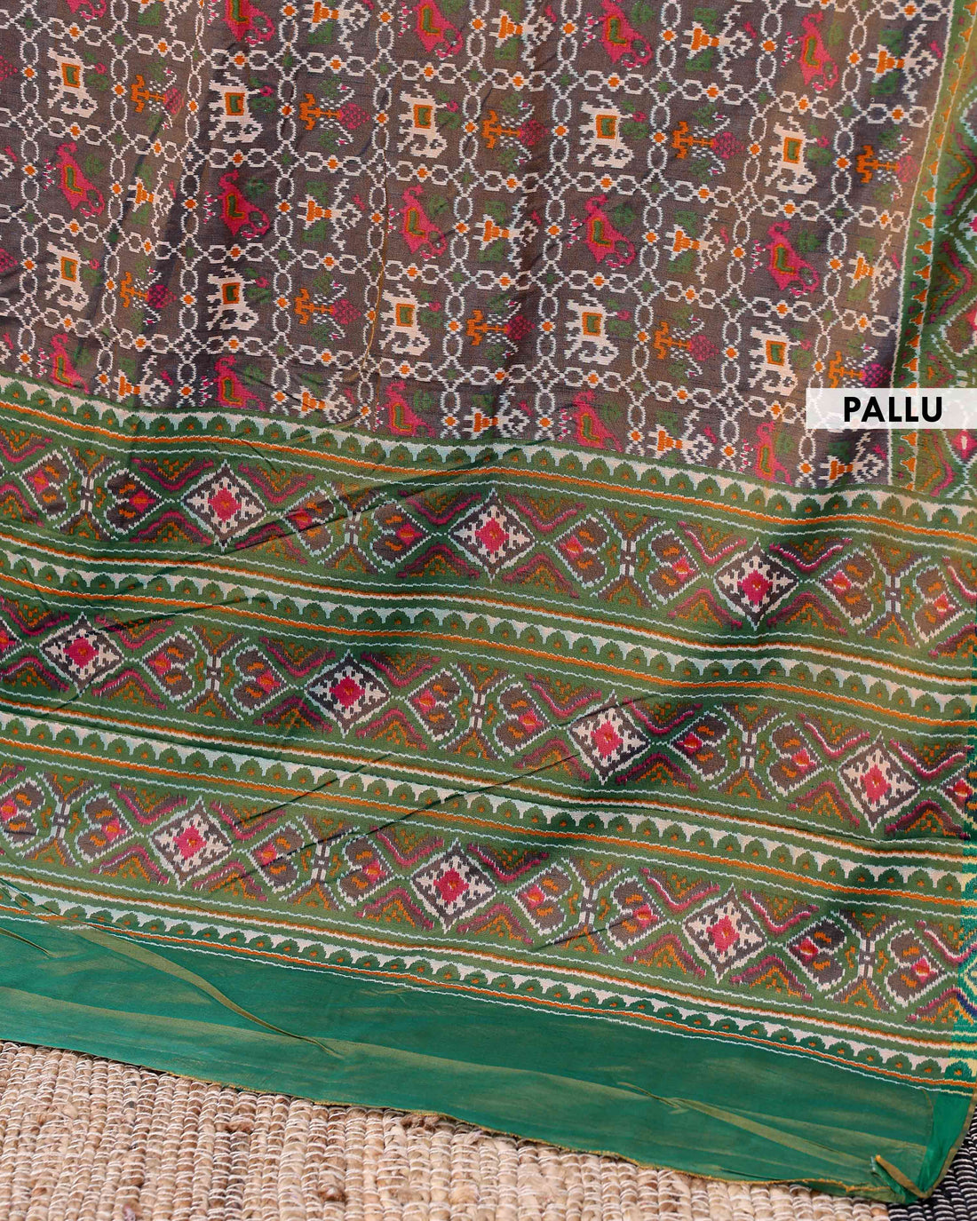 Handwoven Patola Silk Saree with Intricate Ikat Weave and Traditional Geometric Motifs - Brown