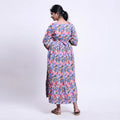Women’s maternity wear dress with waist tie multicolor print short sleeves back view with relaxed fit
