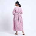 Pink printed maternity wear with empire waist and three quarter sleeves front view 