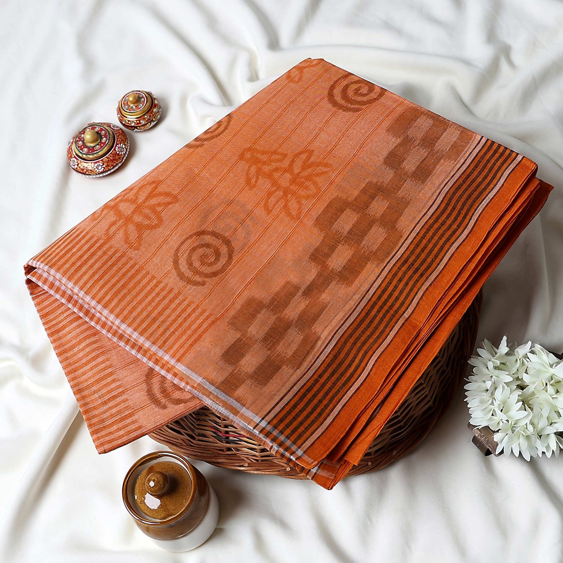 Bengal Cotton Saree With Geometric Motifs And Striped Border In Orange Draped On Mannequin Front View With Detail Panels