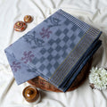 Bengal Cotton Saree With Floral Woven Motifs, Checked Pattern And Striped Border In Grey Top Folded View