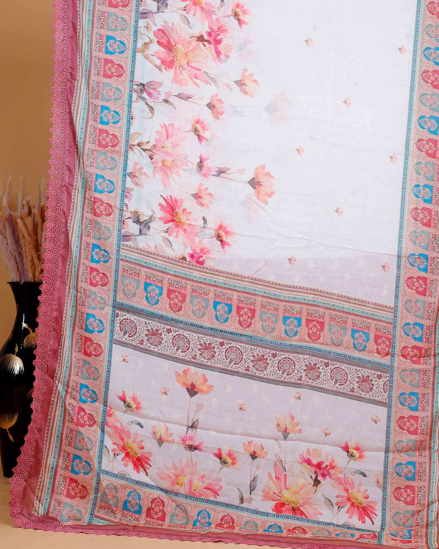 Elegant Georgette Saree with Intricate Floral Embroidery and Traditional Patterned Border - Cream