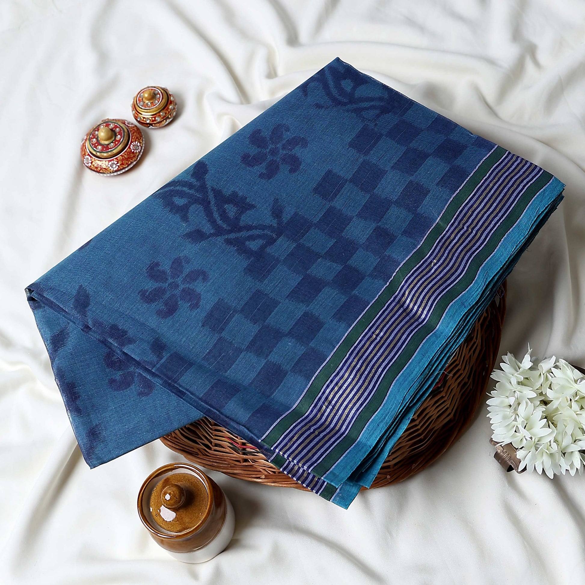 Bengal Cotton Saree With Floral Woven Motifs, Checked Pattern And Striped Border In Dark Blue Top Folded View
