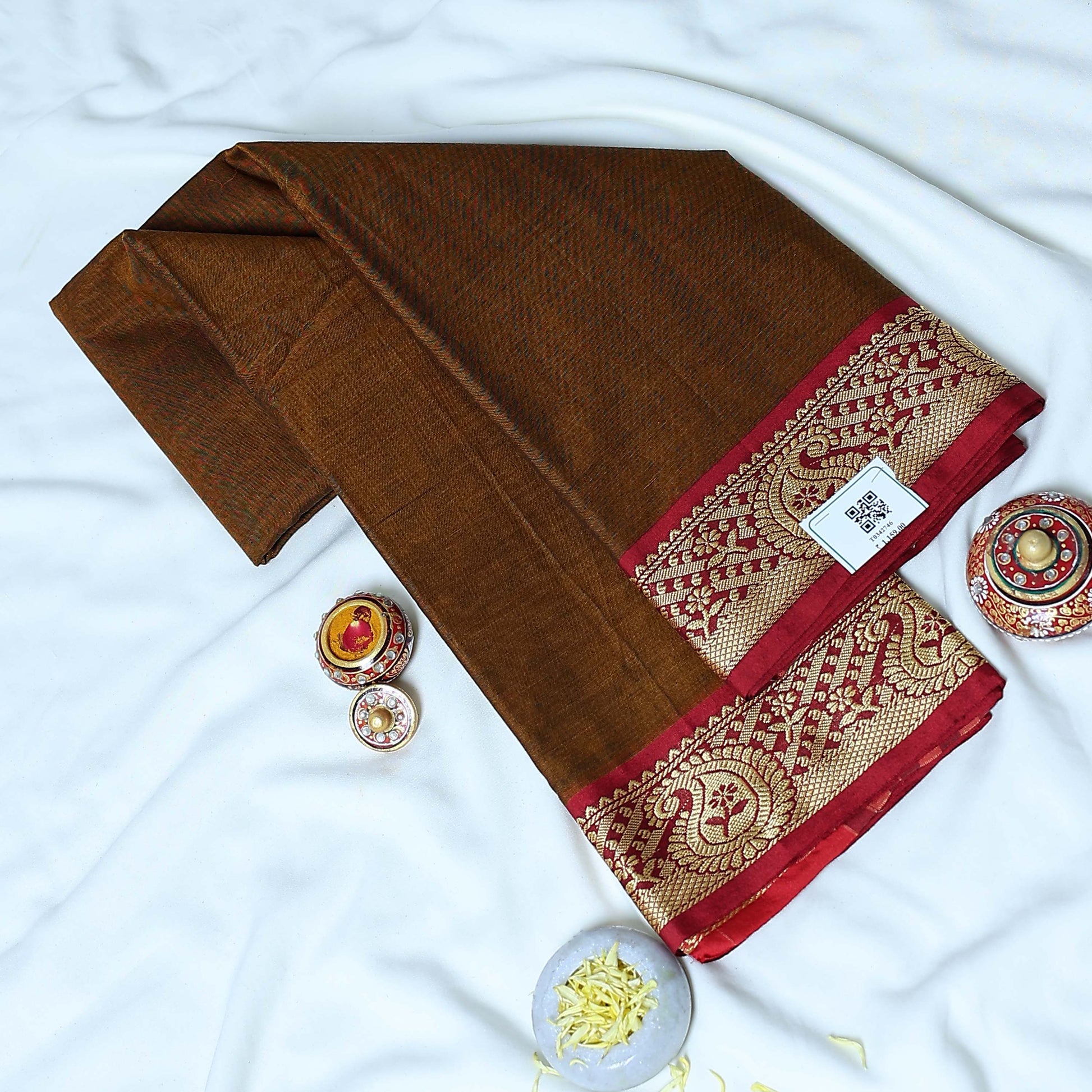 Brown Mangalagiri Cotton Saree With Gold Zari Floral Border And Red Contrast Edge -Top Folded View