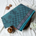 Bengal Cotton Saree With Floral Woven Motifs, Checked Pattern And Striped Border In Light Teal Top Folded View