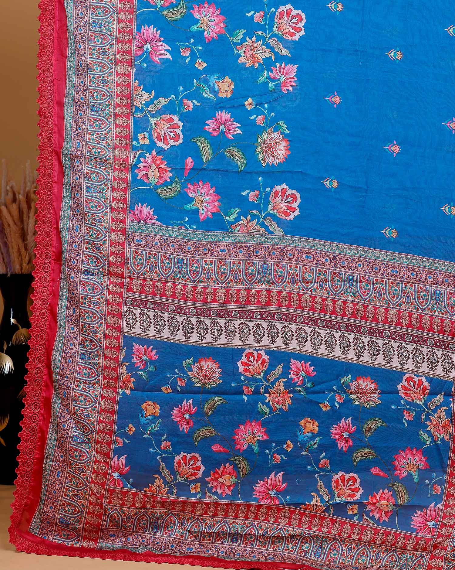 Elegant Georgette Saree with Intricate Floral Embroidery and Traditional Patterned Border - Blue