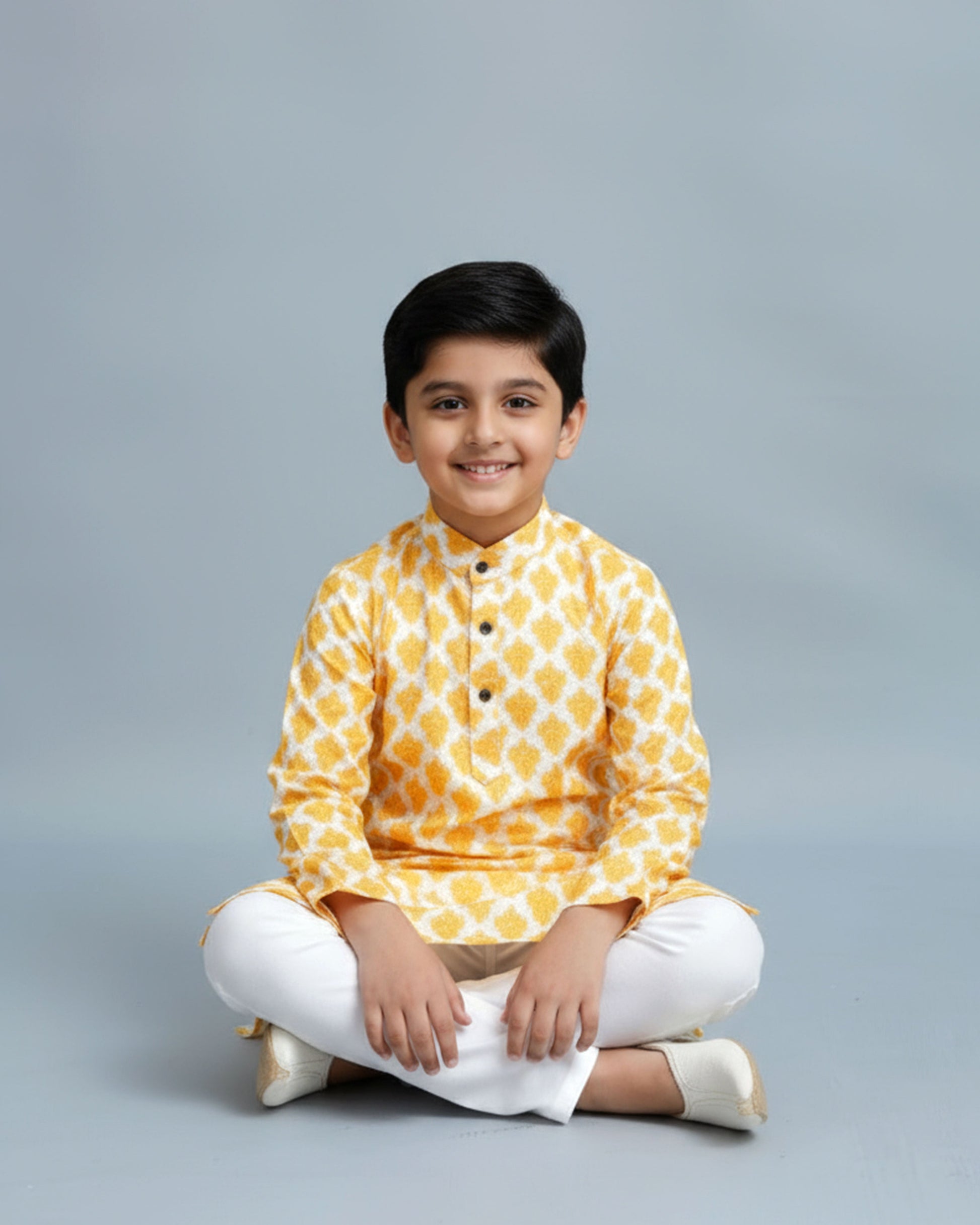Boys green kurta adorned with traditional Bandhani-inspired patterns in red and gold., Yellow