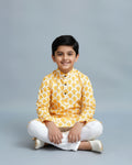 Boys green kurta adorned with traditional Bandhani-inspired patterns in red and gold., Dark Green