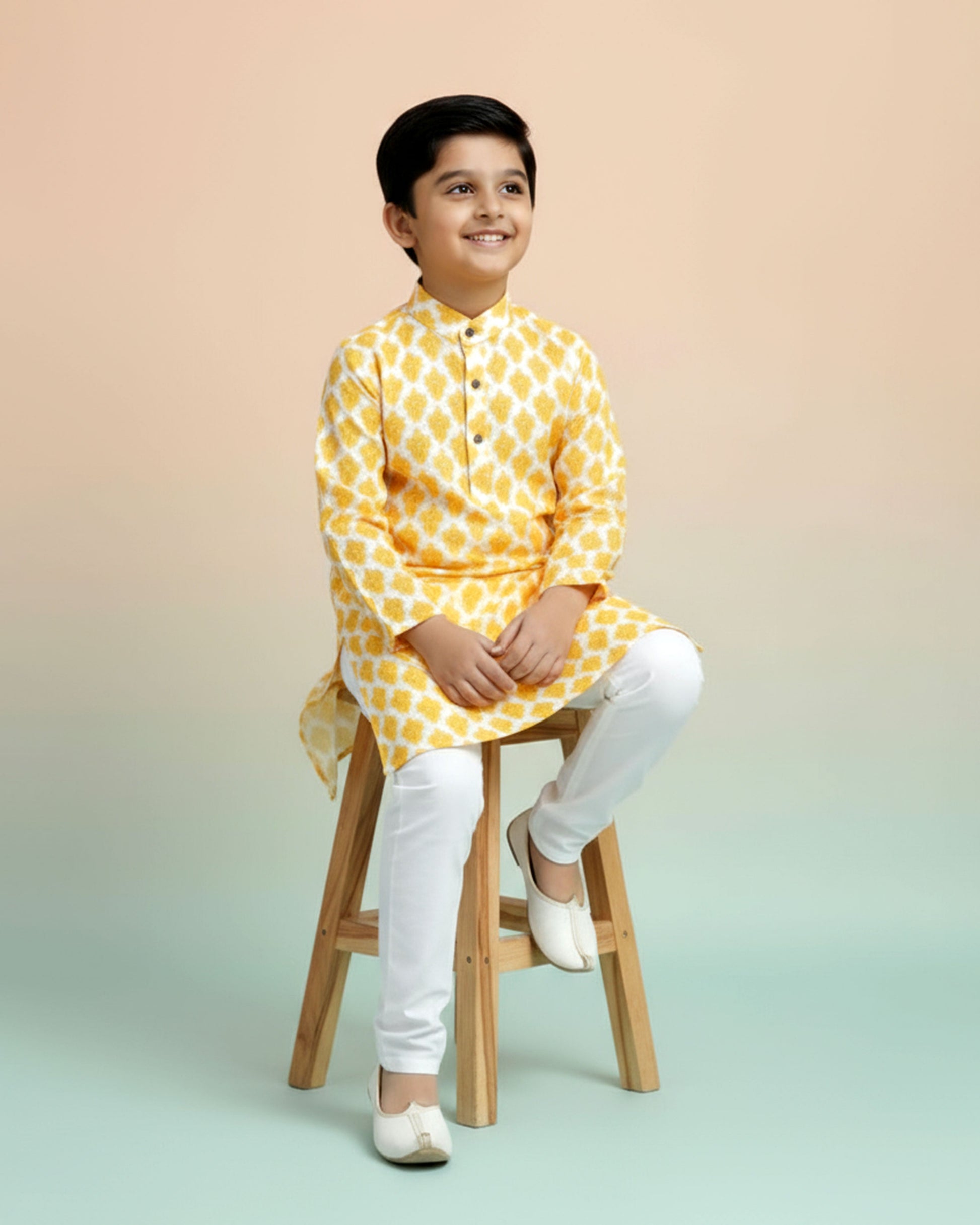 Boys green kurta adorned with traditional Bandhani-inspired patterns in red and gold., Yellow