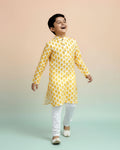 Boys green kurta adorned with traditional Bandhani-inspired patterns in red and gold., Yellow