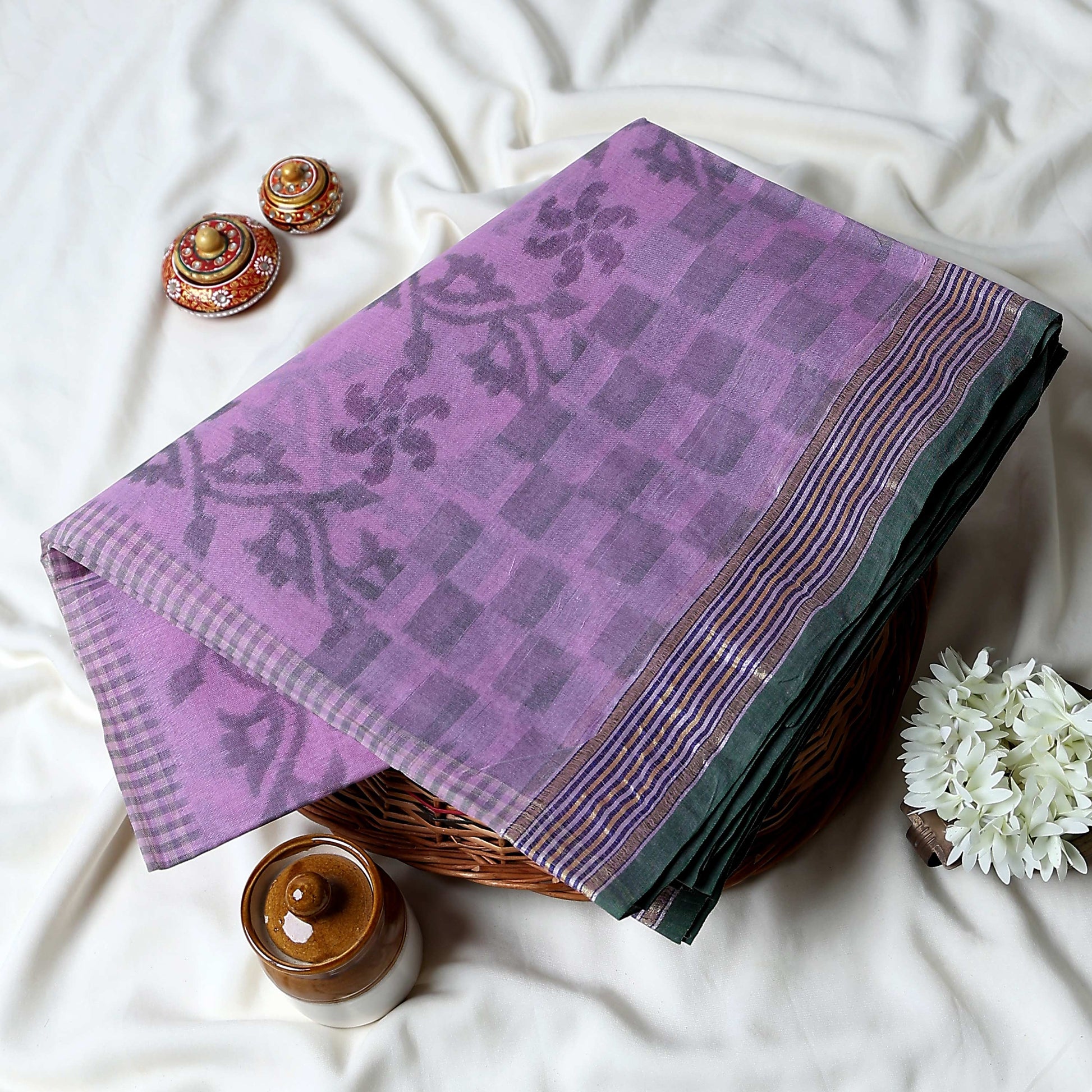 Bengal Cotton Saree With Floral Woven Motifs, Checked Pattern And Striped Border In Pink Top Folded View