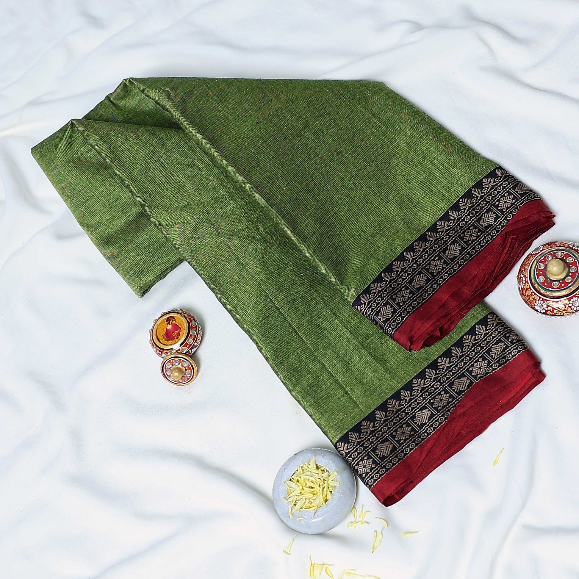 Olive Green Mangalagiri Cotton Saree With Intricate Geometric Zari Border And Red Edging Close Up Folded View