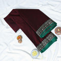 Maroon Mangalagiri Cotton Saree With Intricate Geometric Zari Border And Green Edging Close Up Folded View