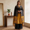Mustard Salwar Material Set With Black Pants Fabric And Colorful Ikat Dupatta Full Length Front View